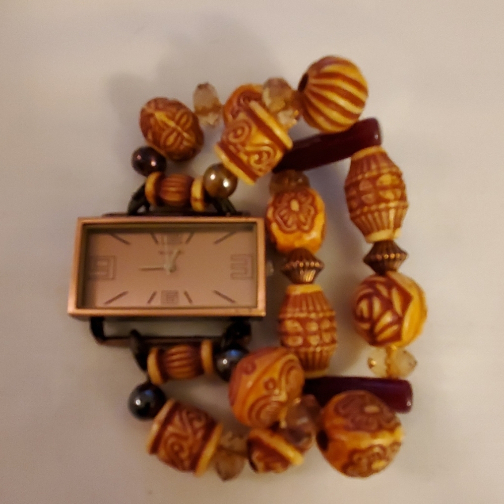 Brown beaded wstch